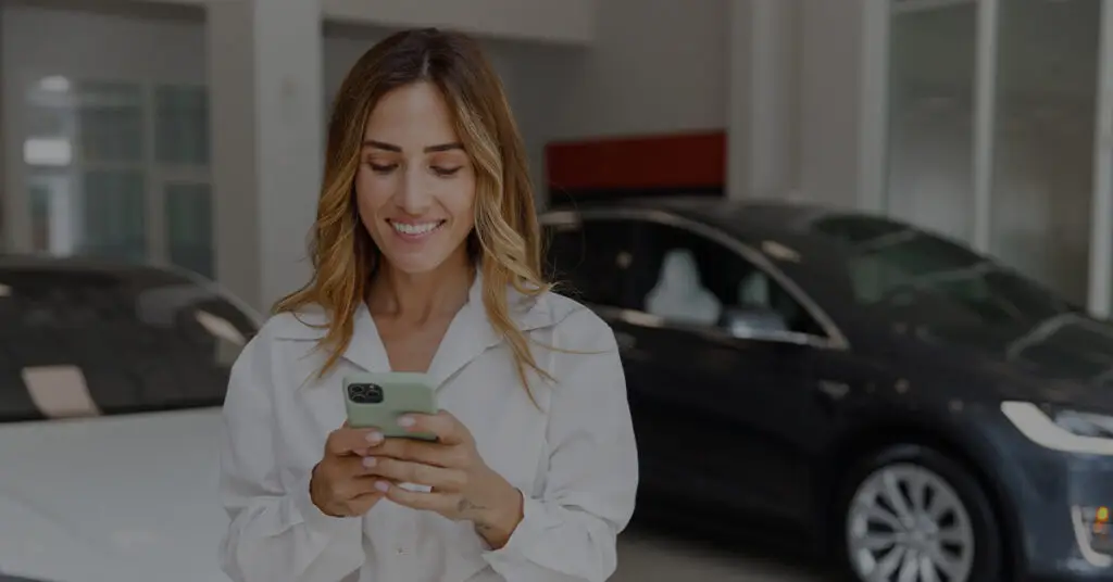 Female Car Shopper Searching for Cars on iPhone